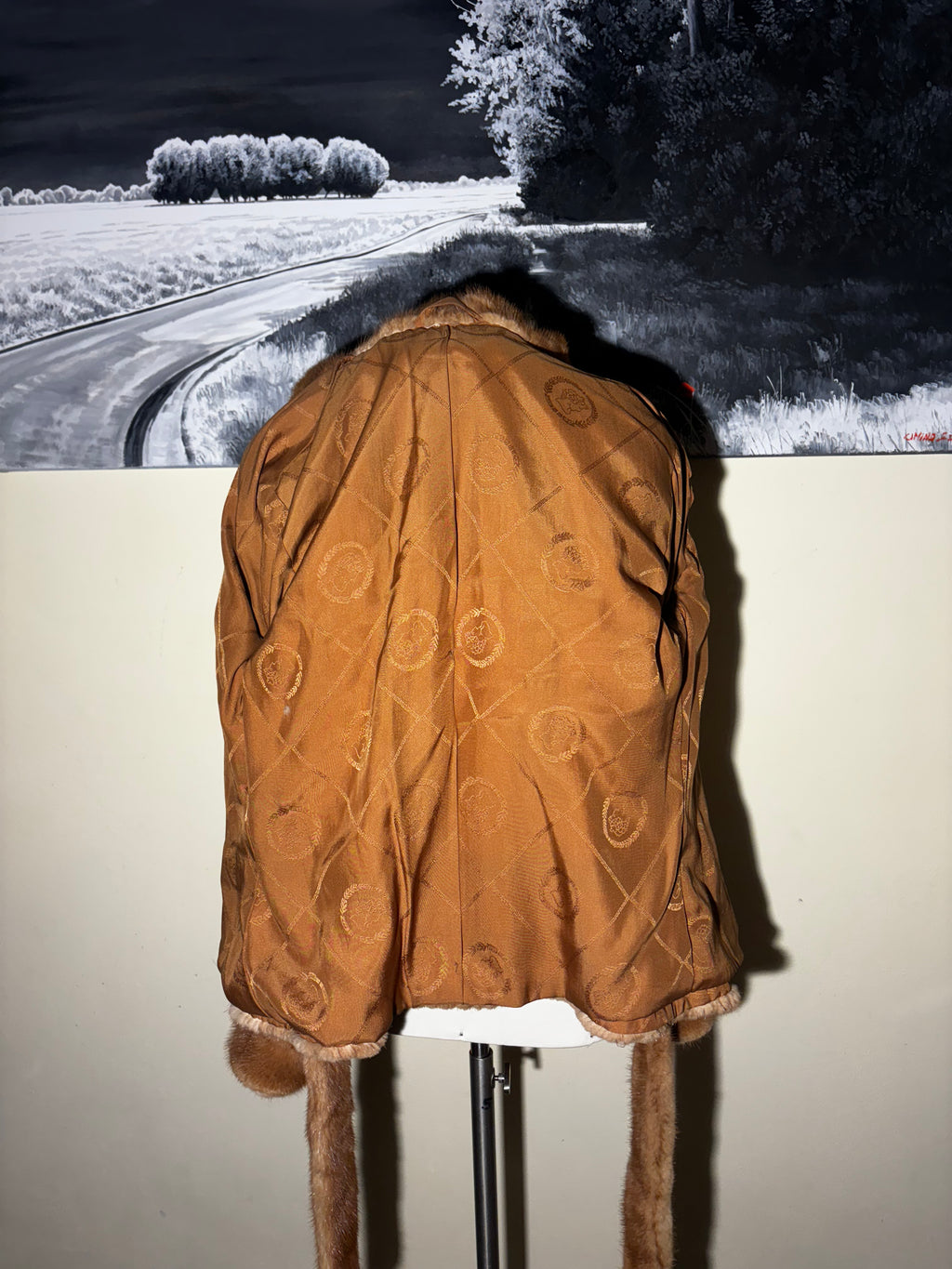 Visone con cappuccio